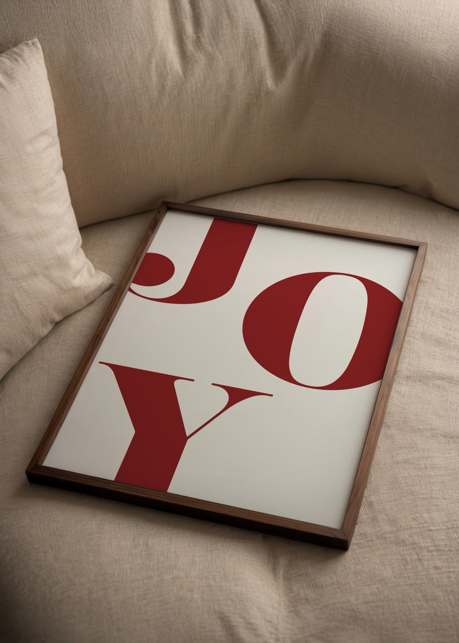Joyful typography art print featuring bold letters in red.