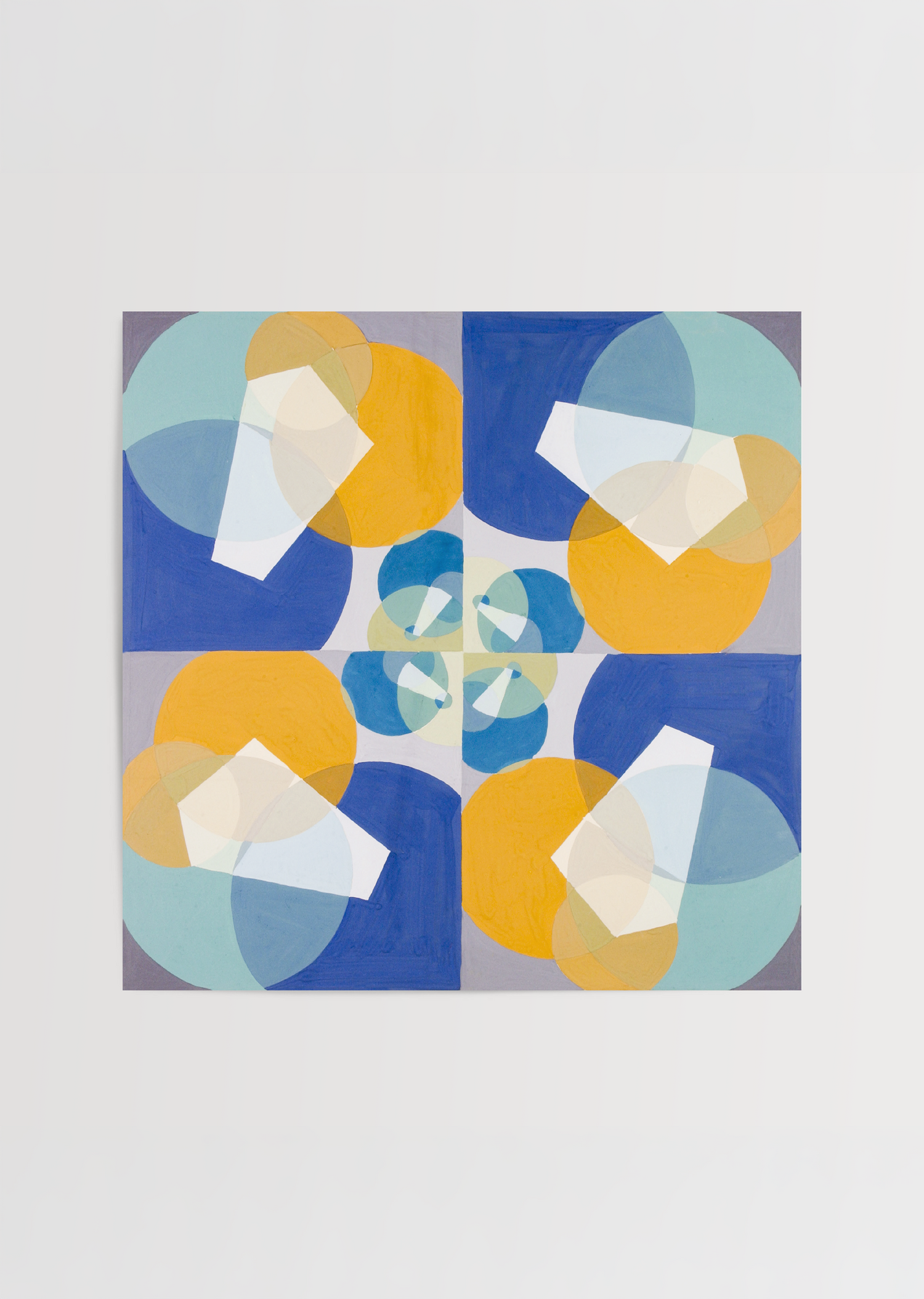 Abstract wall art featuring vibrant geometric shapes in blue, yellow, and soft neutrals.