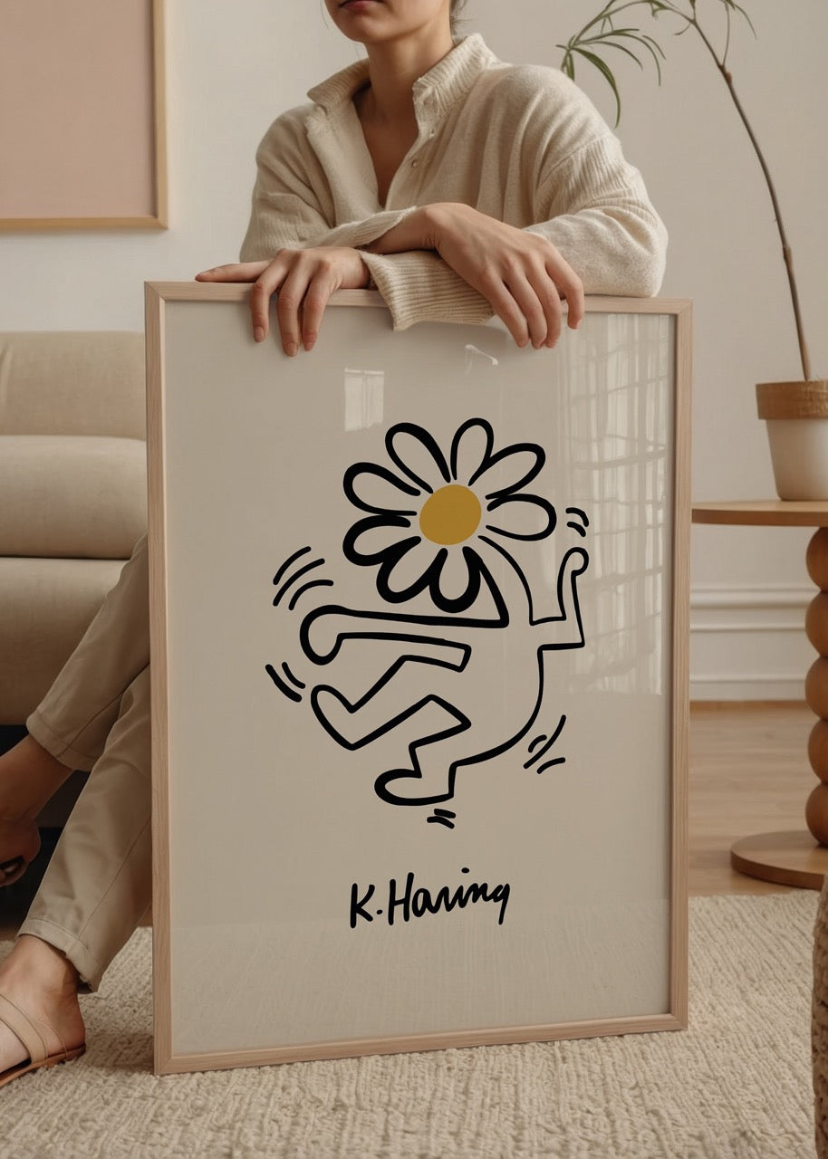Art print of a dancing figure with a flower head against a beige background.