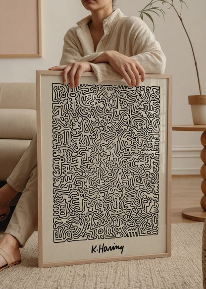 An abstract expressionist poster featuring dynamic black lines on a white background.