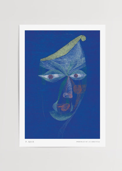 Abstract portrait artwork featuring a mystical visage in blue tones.