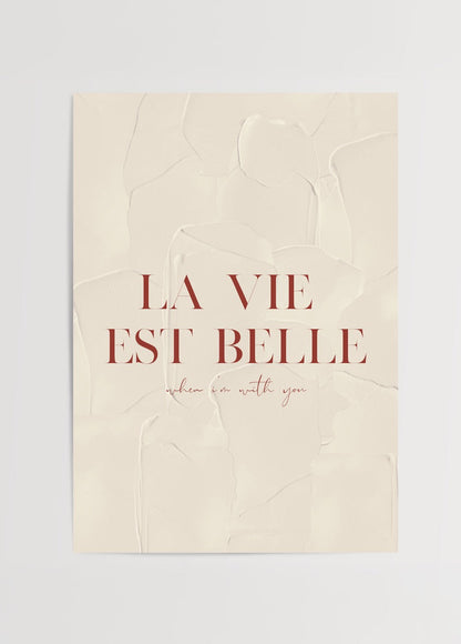 Elegant typography wall art with a textured beige background.