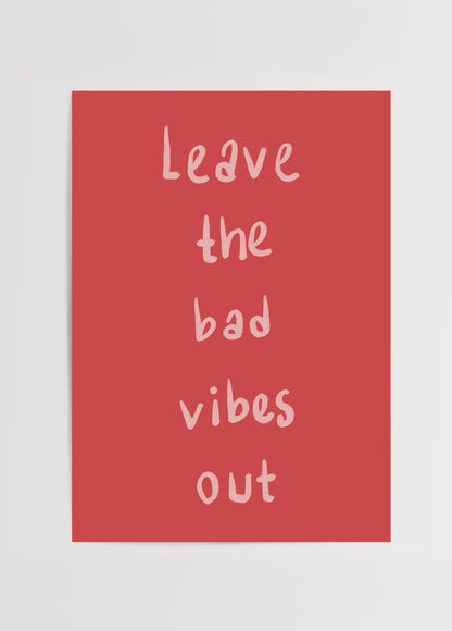 Leave the Bad Vibes Out poster in vibrant red with playful typography.