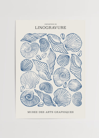 Intricate linocut print of shells in blue tones