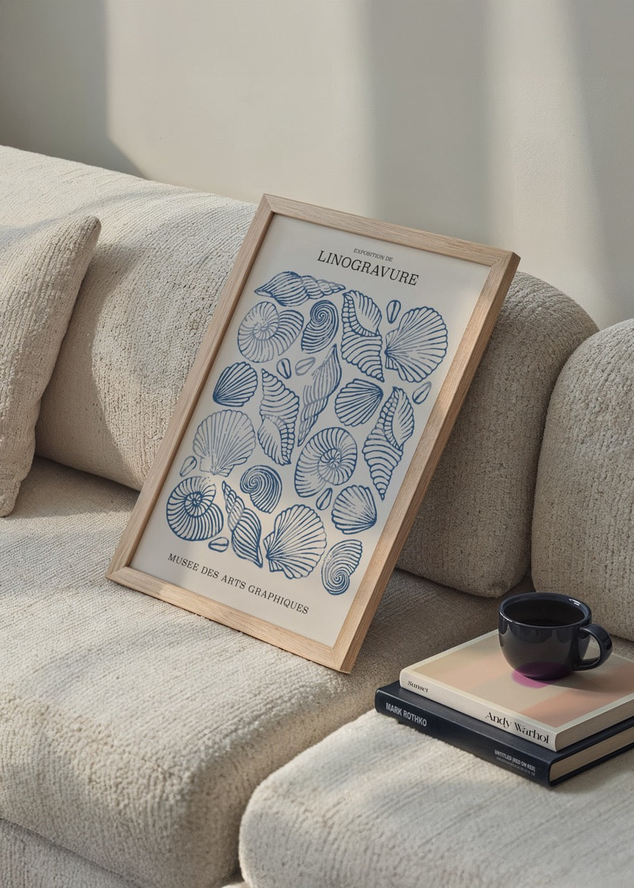 Intricate linocut print of shells in blue tones