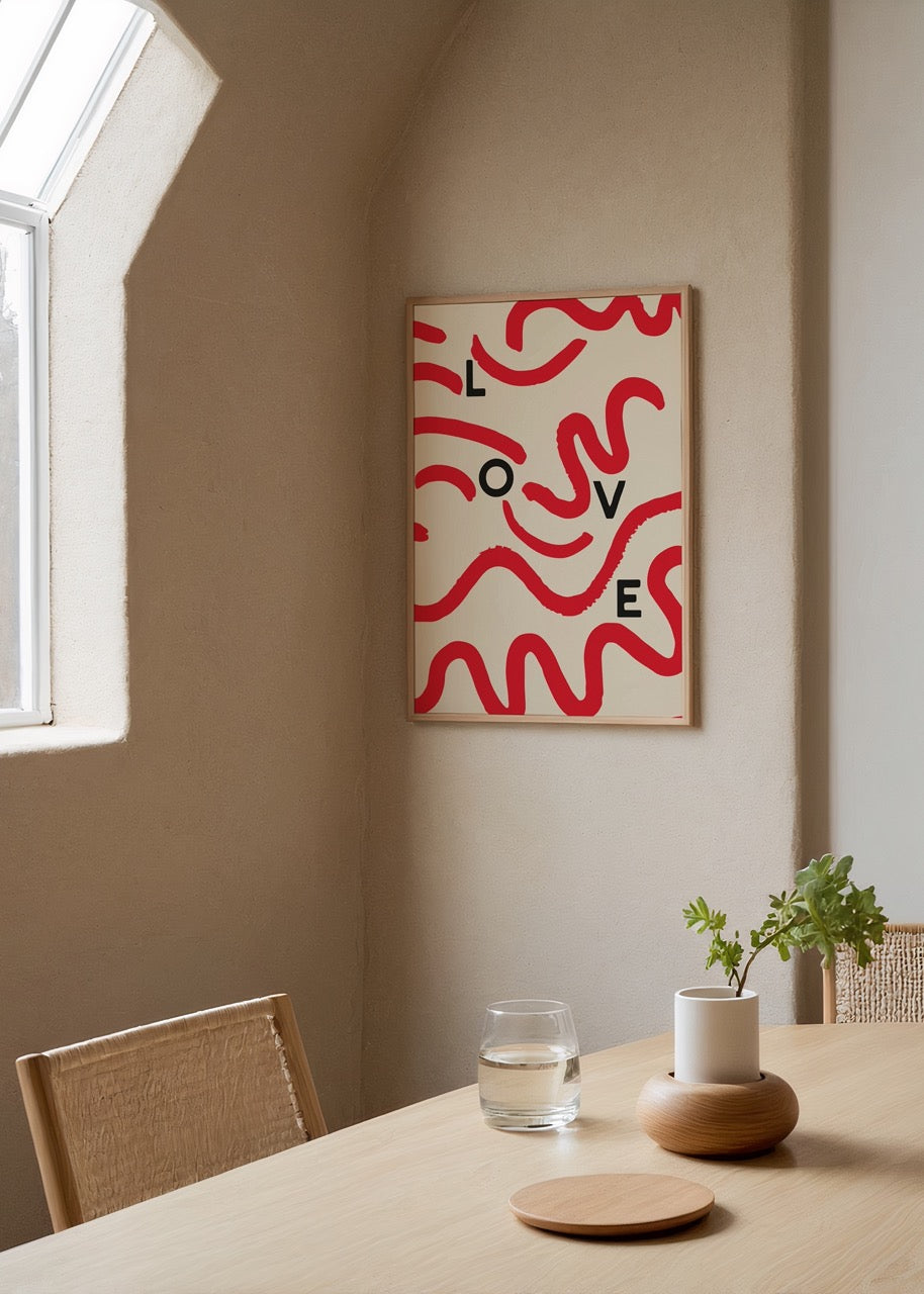 Abstract wall art featuring bold red waves and the word LOVE on a beige background.