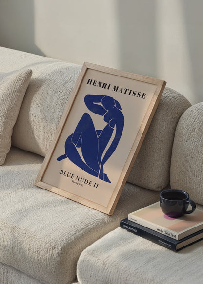 Abstract artwork featuring a blue figure on beige background, perfect for contemporary wall art styling.
