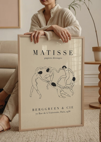 Elegant wall art depicting a dance of figures in motion.