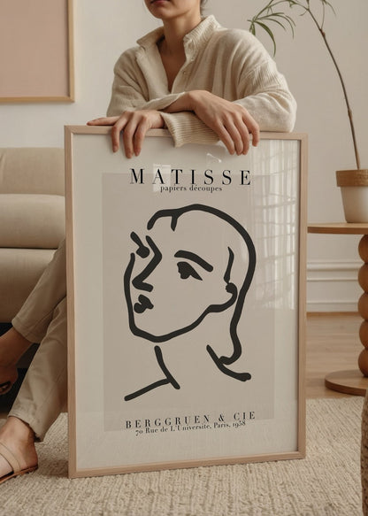 Elegant line drawing portrait artwork in minimalist style.