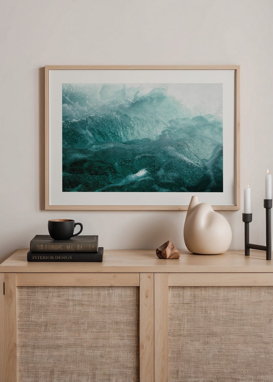 Abstract ocean waves in soothing blue and green tones.