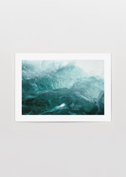 Abstract ocean waves in soothing blue and green tones.