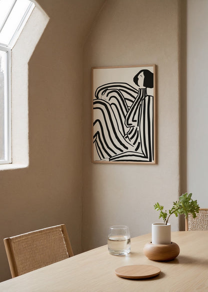 Elegant minimalist line art print featuring fluid black lines.