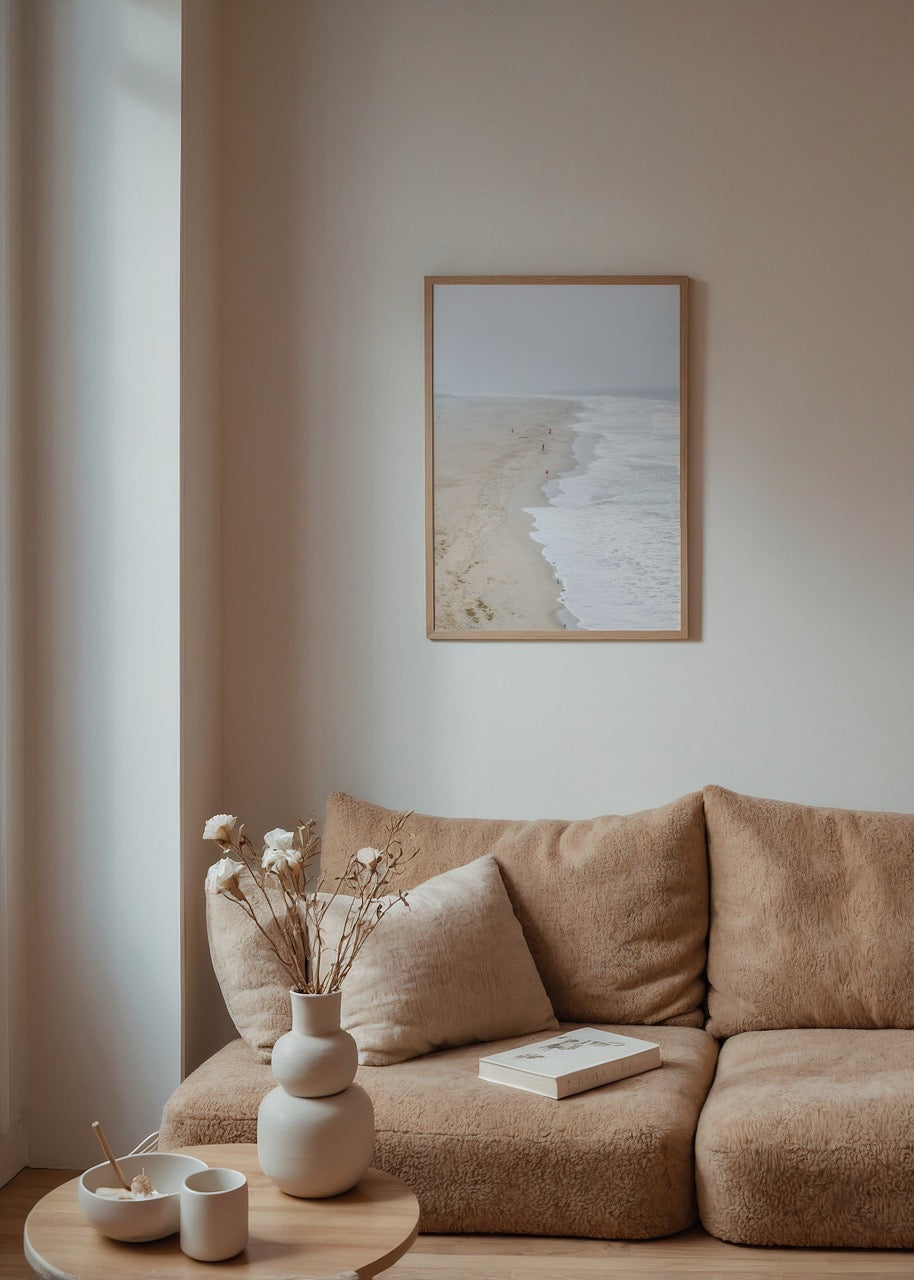 Minimalist coastal art print featuring serene beach and waves.
