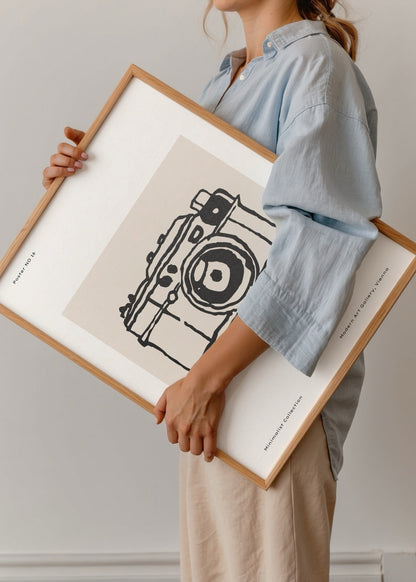 Artistic line drawing of a camera on a beige background.