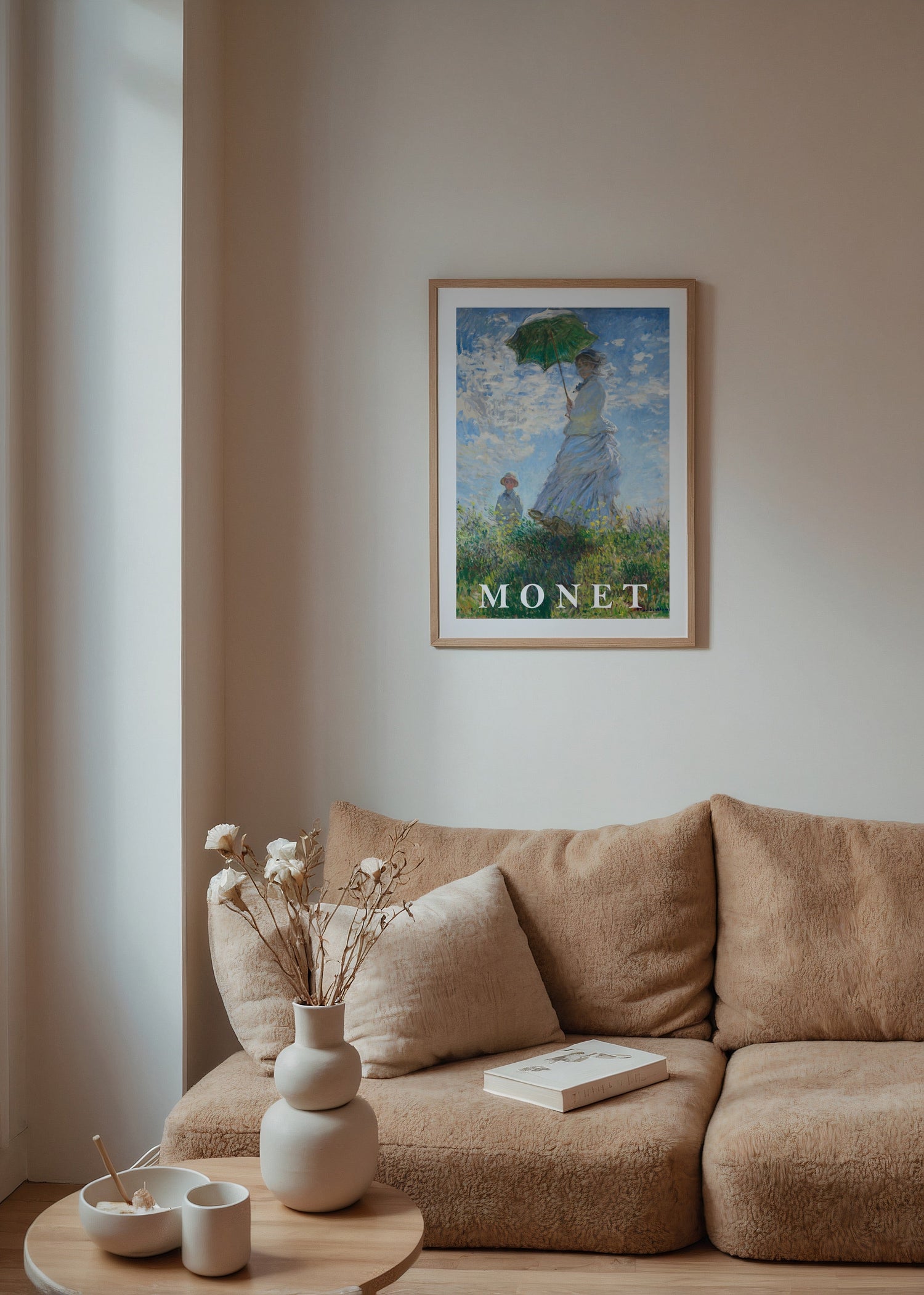 A vibrant poster of a woman with a parasol in an impressionist style.
