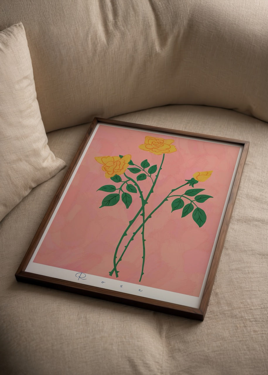A vibrant poster print featuring yellow roses on a soft pink background.