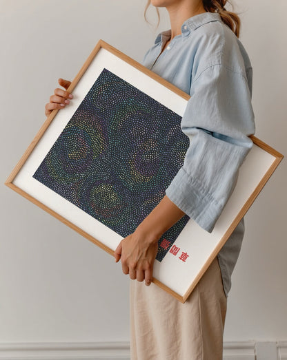 Vibrant cosmic circles wall art with multicoloured dots.
