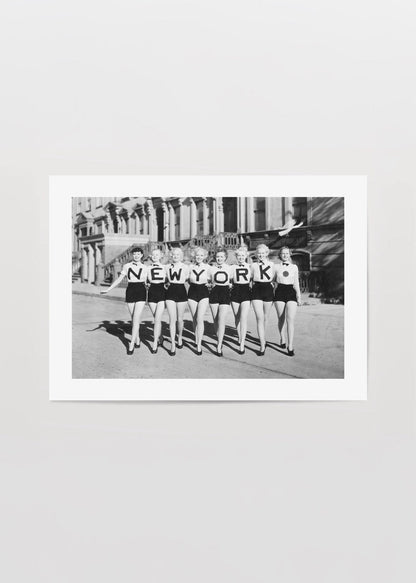 Vintage black and white print of a swimwear parade in New York