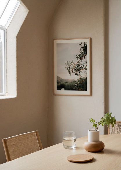 Olive branch with olives against a tranquil backdrop