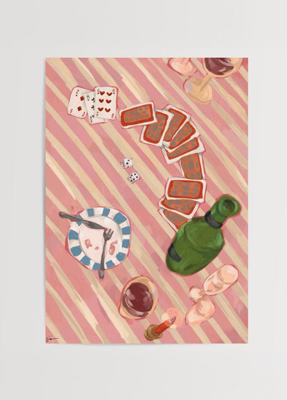 A playful arrangement of cards, wine, and dining items in &