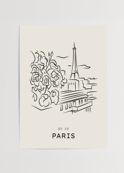 Elegant black and white wall art featuring the Eiffel Tower and floral elements.