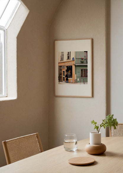 Photographic print of a quaint Paris storefront featuring soft hues.