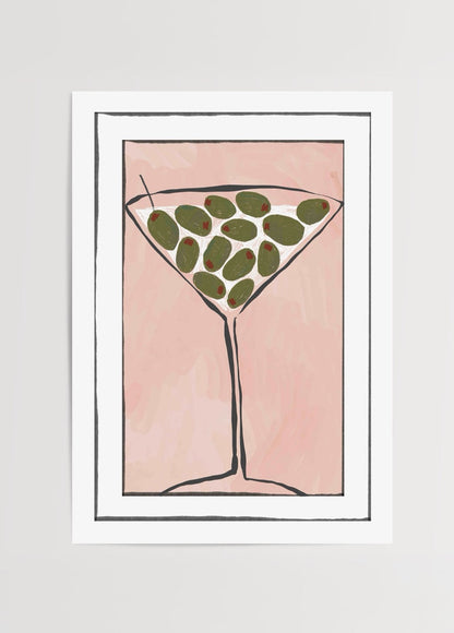 Illustration of a martini glass with olives on a pink background.