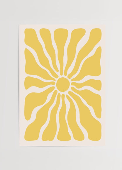 Abstract print featuring a vibrant yellow sunburst design.