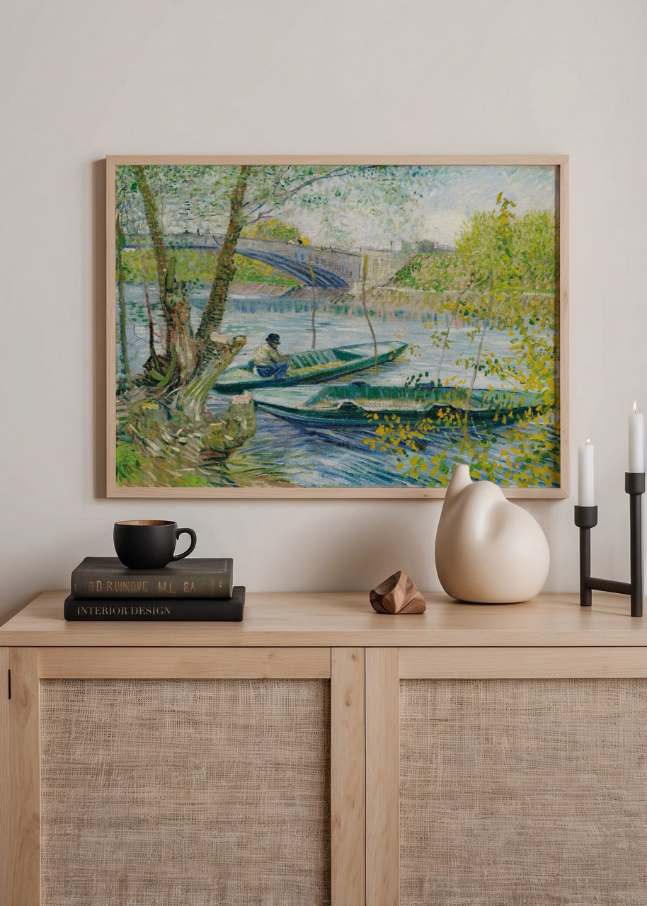 A serene landscape featuring boats by a river under a bridge, surrounded by lush greenery.