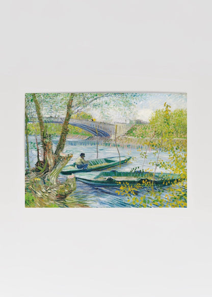 A serene landscape featuring boats by a river under a bridge, surrounded by lush greenery.