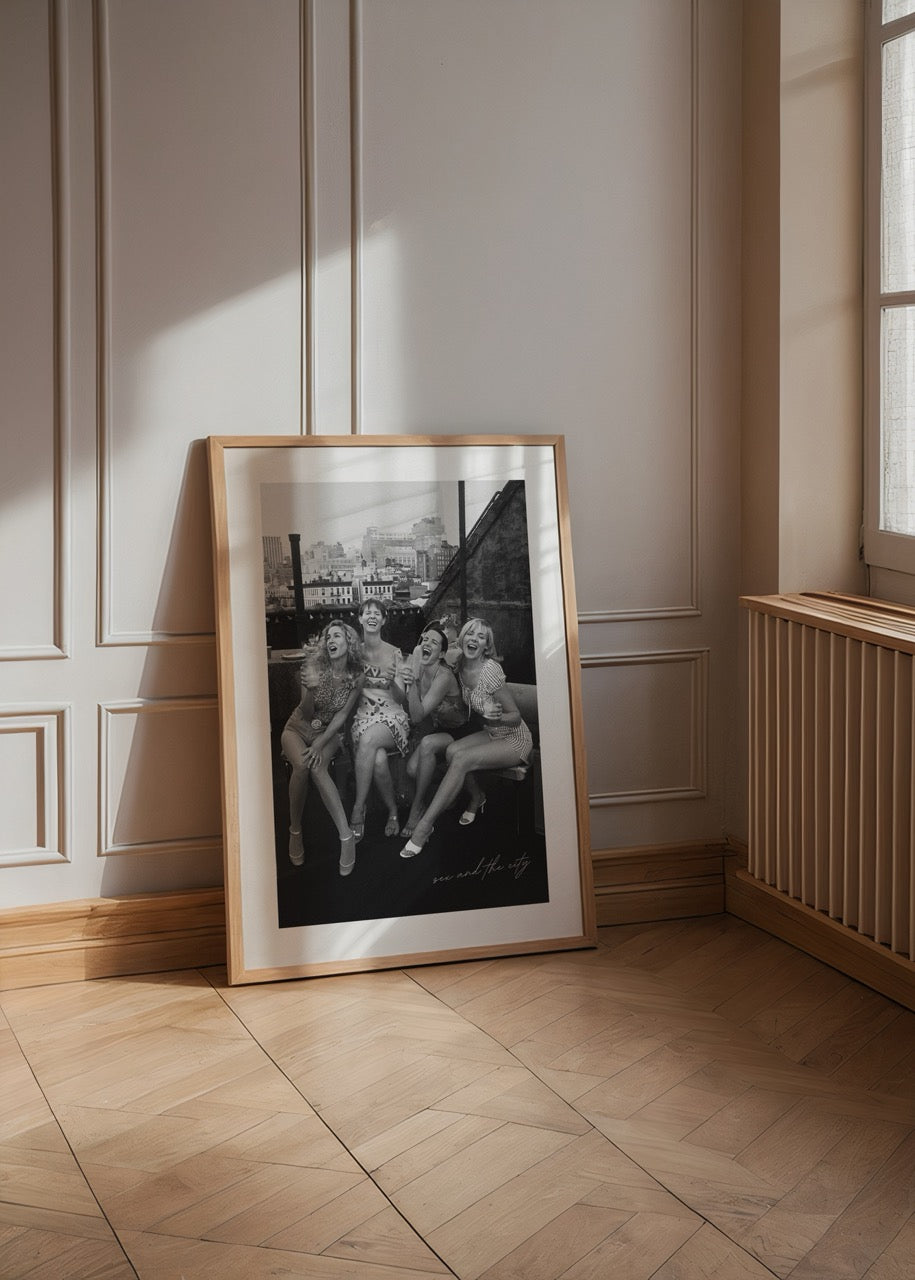 Monochrome wall art depicting urban friendship in a city setting.