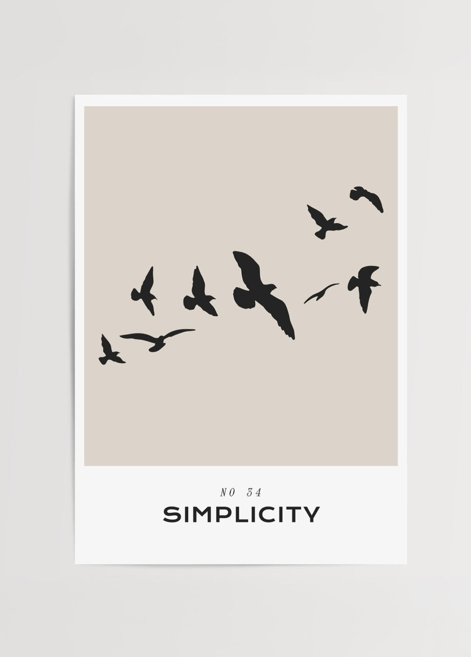 Silhouette of birds flying against a beige background