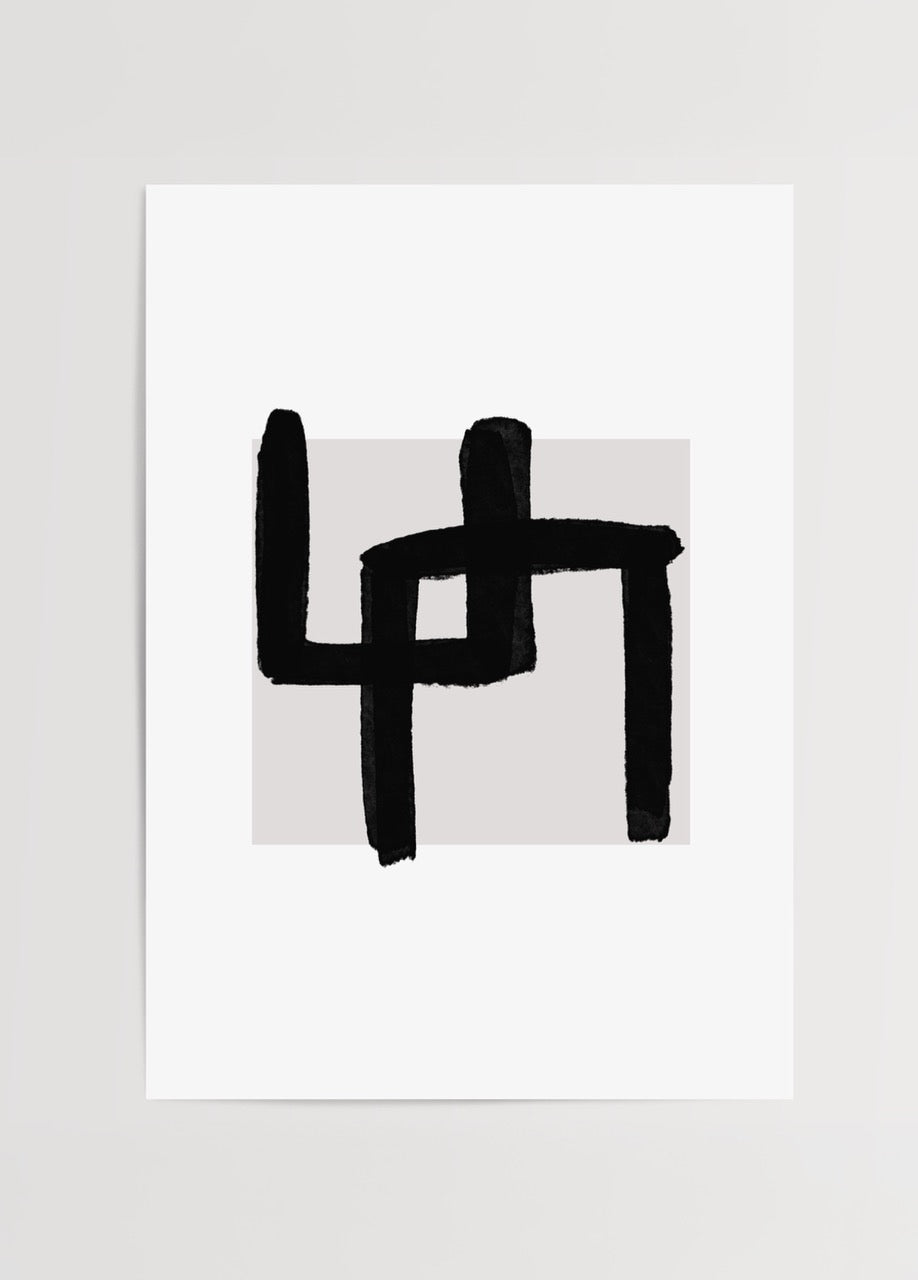 Bold brushstroke abstract wall art in black on a neutral background.