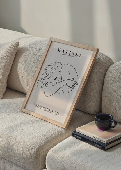 Minimalist line art poster depicting a serene sleeping woman.