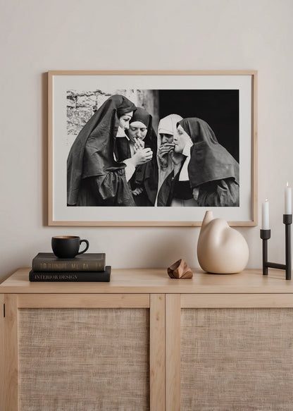 Vintage photograph of nuns sharing a moment, perfect for wall art.