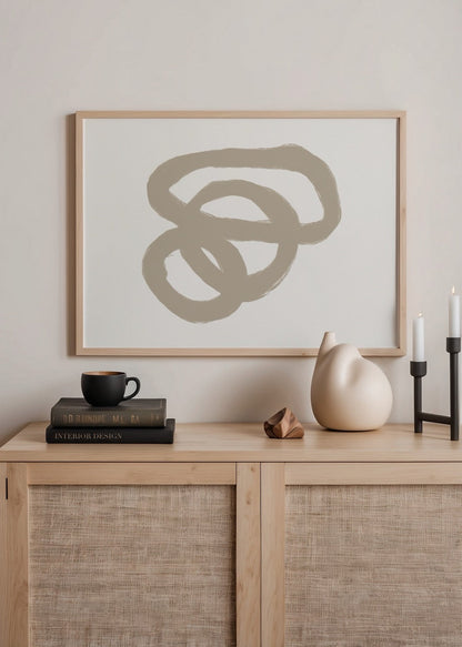 Abstract wall art featuring soft, organic loops in neutral tones.