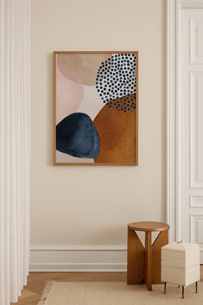 Abstract artwork featuring soft colour blocks and playful dots in warm tones.