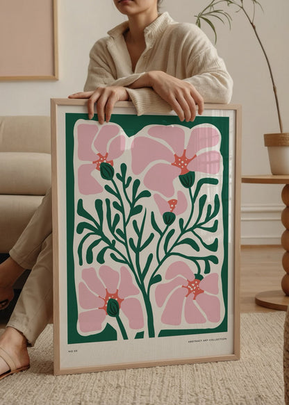 A vibrant pink floral art print with green leaves, perfect for modern interiors.
