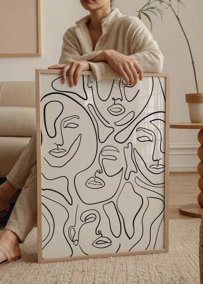 Abstract line faces art print showcasing minimalist design.