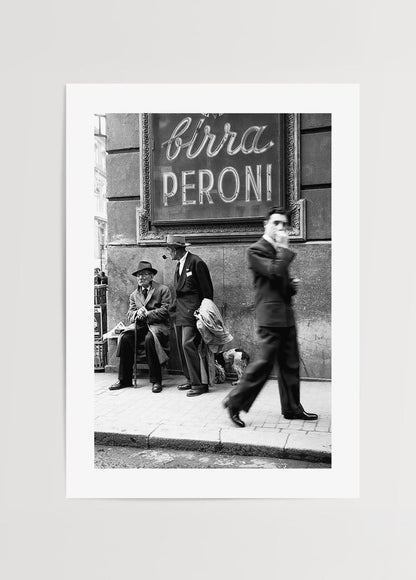 Black and white street scene poster art featuring figures and vintage signage.
