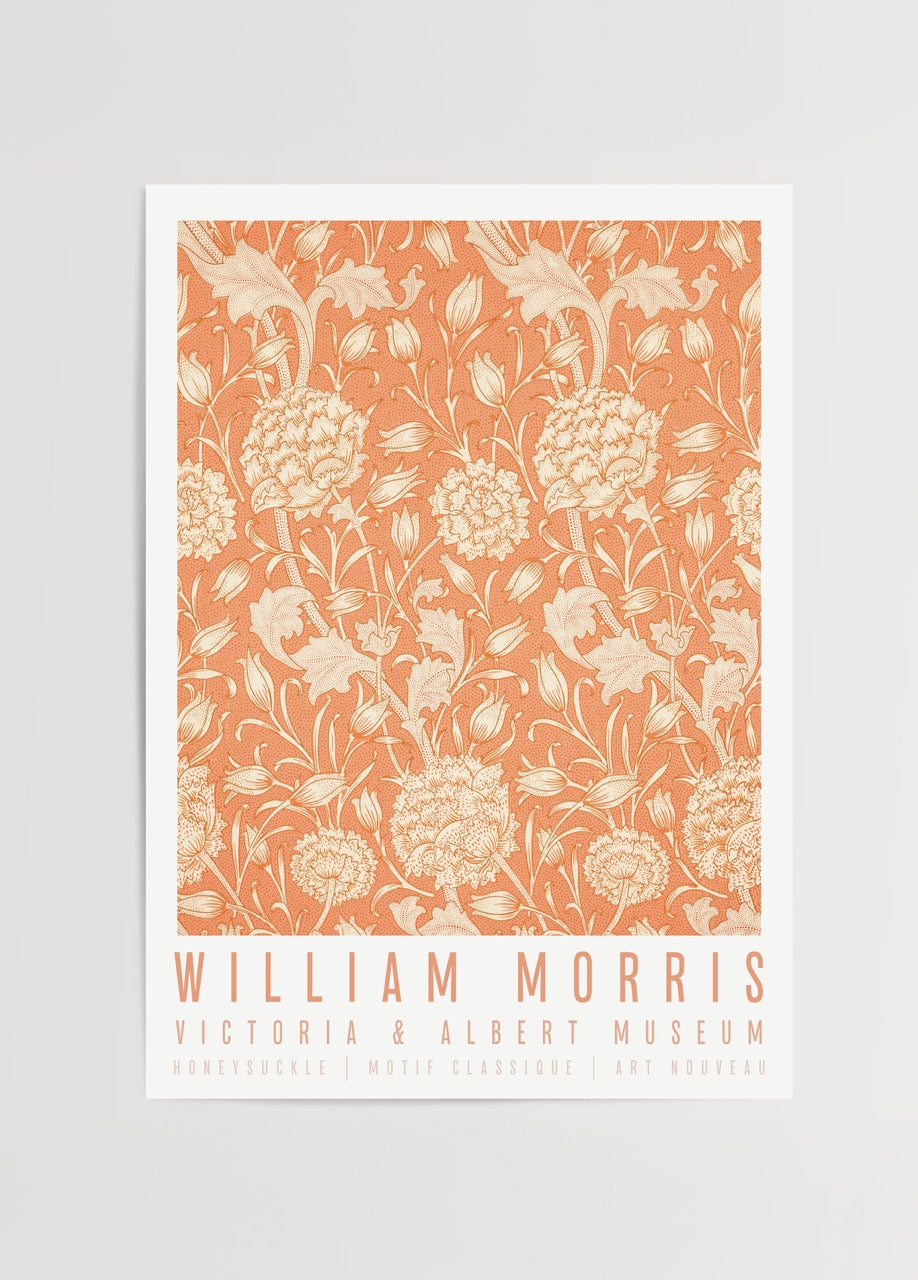 Floral wall art featuring intricate honeysuckle patterns in warm tones.