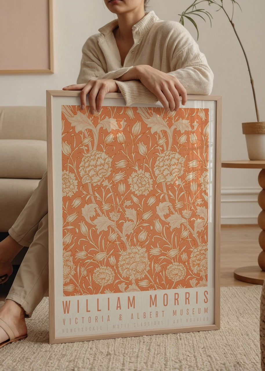 Floral wall art featuring intricate honeysuckle patterns in warm tones.