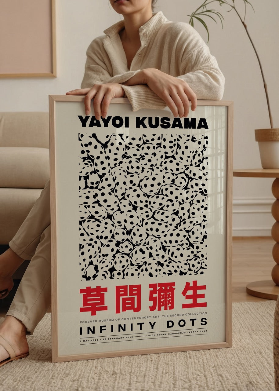 Yayoi Kusama Infinity Dots Poster featuring bold black dots on a white background.