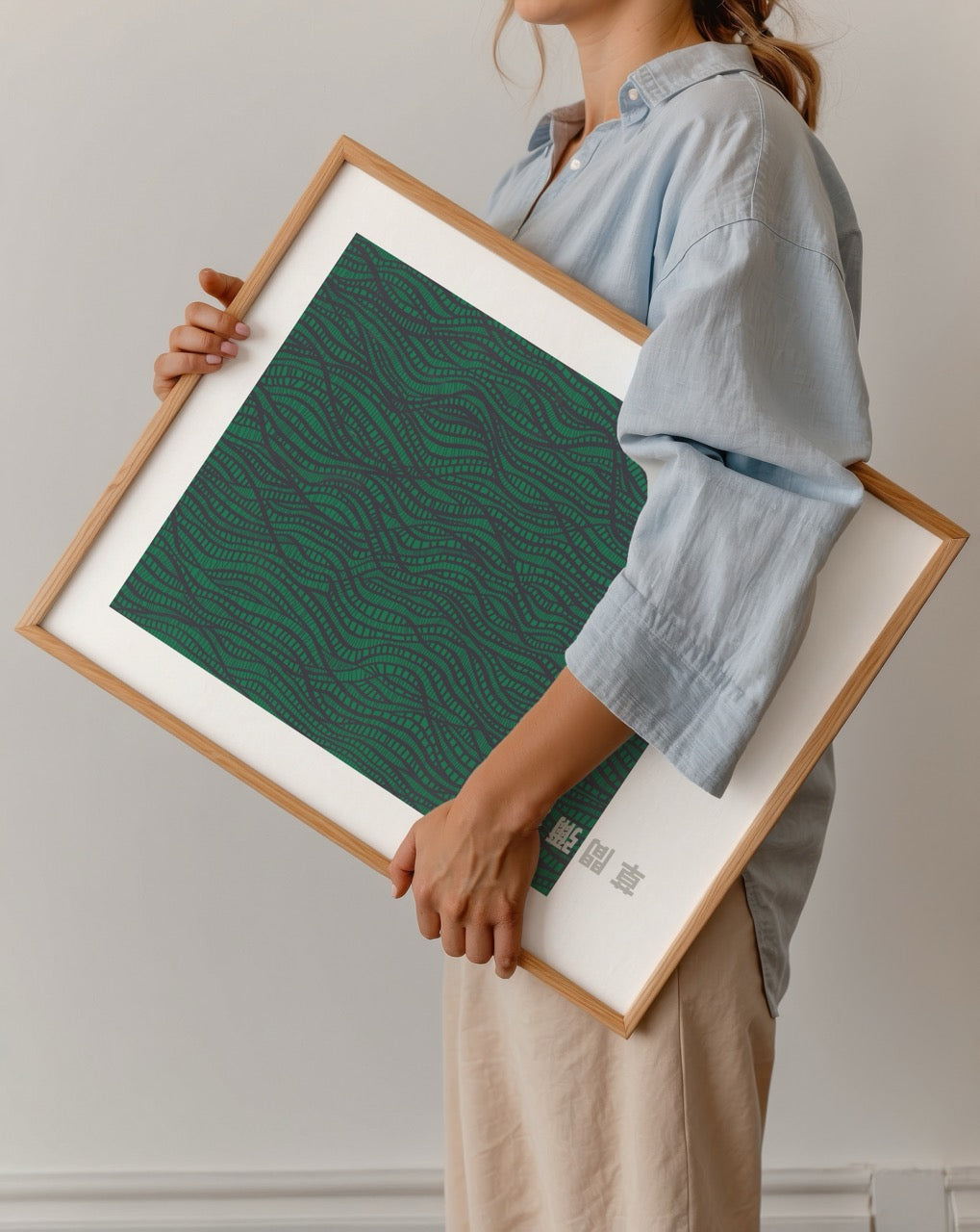 A premium wall art print featuring flowing green patterns, adding elegance to interior spaces.