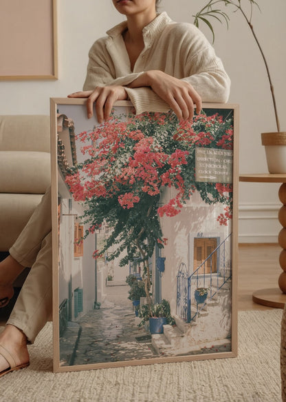 Beautiful Mediterranean street adorned with vibrant bougainvillea flowers.
